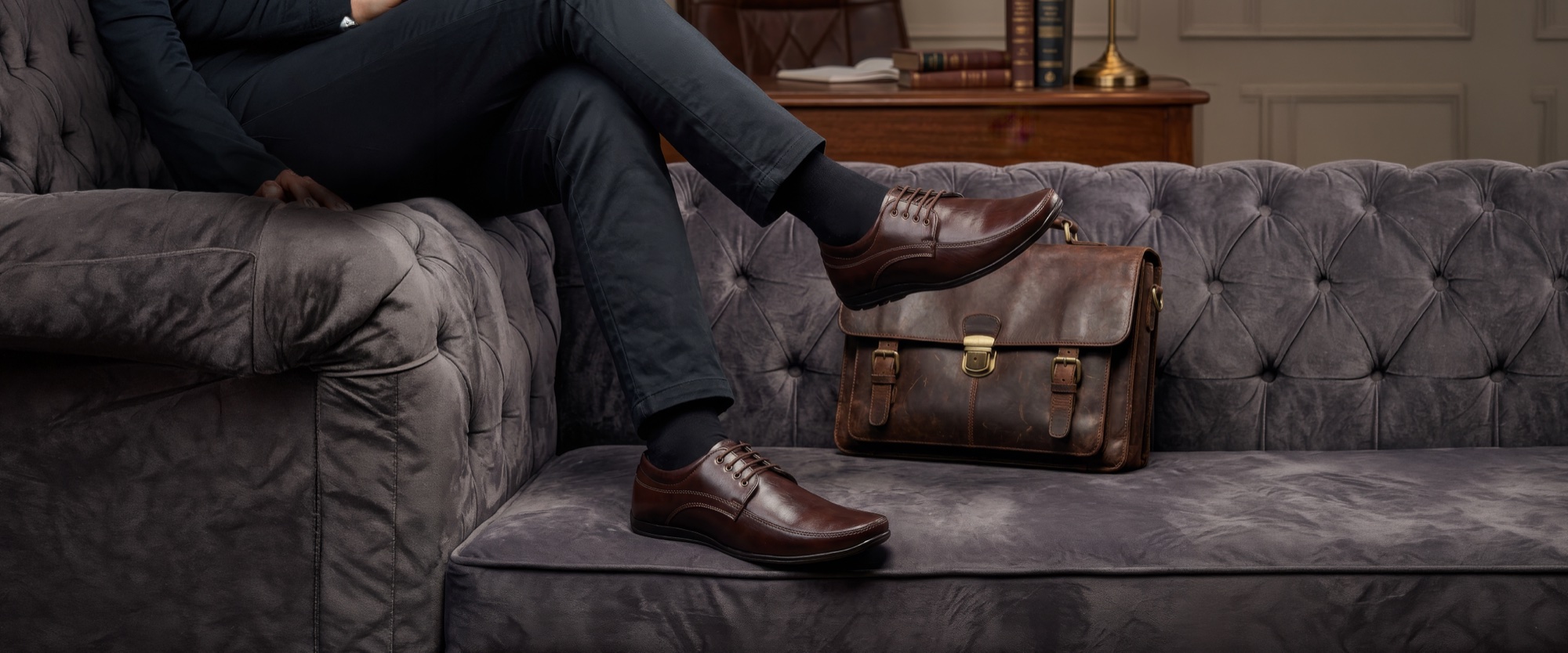 Sparo derbies and a briefcase on a study sofa